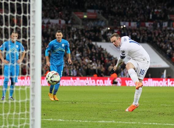 England s Wayne Rooney scoring his sides opening goal - International European Qualifier - England vs Slovenia- Wembley Stadium - London - England - 15th November 2014 - Picture David Klein Sportimage EDITORIAL USE ONLY. No use with unauthorised audio, video, data, fixture lists, club league logos or live services. Online in-match use limited to 120 images, no video emulation. No use in betting, games or single club league player publications.