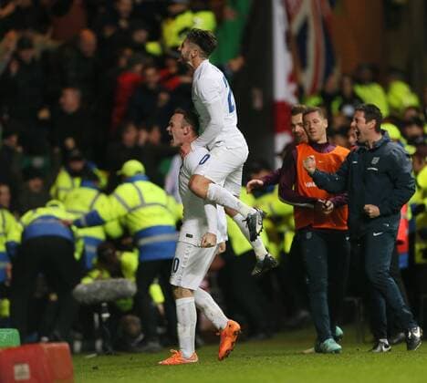 England s Wayne Rooney celebrates scoring his sides third goal - International Friendly - Scotland vs England- Celtic Park - Glasgow - Scotland - 18th November 2014 - Picture David Klein Sportimage EDITORIAL USE ONLY. No use with unauthorised audio, video, data, fixture lists, club league logos or live services. Online in-match use limited to 120 images, no video emulation. No use in betting, games or single club league player publications.