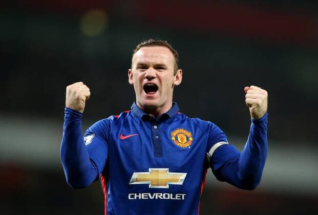 Wayne Roony of Manchester United celebrates after scoring during the Barclays Premier League match between Arsenal and Manchester United at Emirates Stadium in London, on Nov. 22, 2014. Manchester United won 2-1. ) FOR EDITORIAL USE ONLY. NOT FOR SALE FOR MARKETING OR ADVERTISING CAMPAIGNS. NO USE WITH UNAUTHORIZED AUDIO, VIDEO, DATA, FIXTURE LISTS, CLUB LEAGUE LOGOS OR LIVE SERVICES. ONLINE IN-MATCH USE LIMITED TO 45 IMAGES, NO VIDEO EMULATION. NO USE IN BETTING, GAMES OR SINGLE CLUB LEAGUE PLAYER PUBLICATIONS. (SP)BRITAIN-LONDON-SOCCER-BARCLAYS PREMIER LEAGUE-ARSENAL VS MANCHESTER UNITED HanxYan