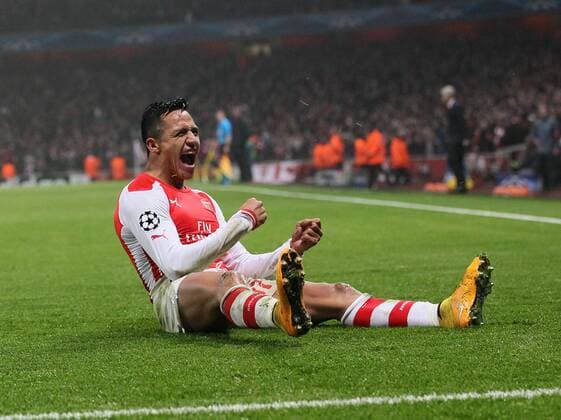 Arsenal s Alexis Sanchez celebrates scoring his sides second goal UEFA Champions League- Arsenal vs Borussia Dortmund- Emirates Stadium - England - 26th November 2014 - EDITORIAL USE ONLY. No use with unauthorised audio, video, data, fixture lists, club league logos or live services. Online in-match use limited to 120 images, no video emulation. No use in betting, games or single club league player publications.