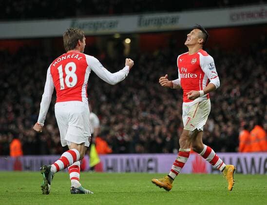 Arsenal s Alexis Sanchez celebrates scoring his sides opening goal Barclays Premier League- Arsenal vs Southampton - Emirates Stadium - England - 3rd December 2014 - Picture David Klein Sportimage EDITORIAL USE ONLY. No use with unauthorised audio, video, data, fixture lists, club league logos or live services. Online in-match use limited to 120 images, no video emulation. No use in betting, games or single club league player publications.