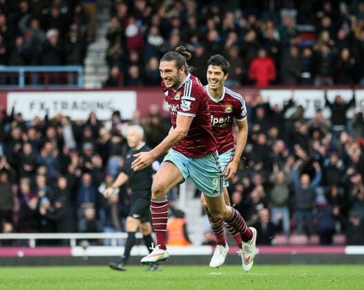 West Ham s Andy Carroll celebrates scoring his sides second goal Barclays Premier League- West Ham United vs Swansea City - Upton Park - England - 7th December 2014 - Picture David Klein Sportimage EDITORIAL USE ONLY. No use with unauthorised audio, video, data, fixture lists, club league logos or live services. Online in-match use limited to 120 images, no video emulation. No use in betting, games or single club league player publications.