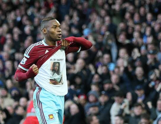 West Ham s Diafra Sakho celebreates scoring his sides third goal by showing his t-shirt Barclays Premier League- West Ham United vs Swansea City - Upton Park - England - 7th December 2014 - Picture David Klein Sportimage EDITORIAL USE ONLY. No use with unauthorised audio, video, data, fixture lists, club league logos or live services. Online in-match use limited to 120 images, no video emulation. No use in betting, games or single club league player publications.