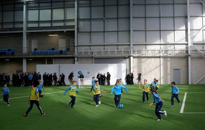 Aktuell Fußball, England, Premier League, Manchester City eröffnet Fußball-Akademie Youngsters from Manchester City s academy try out the new club facilities, during the opening of the new Manchester City Etihad Campus. - Launch of the the City Football Academy - Etihad Campus - Manchester - England - 8th December 2014 - Picture David Thompson-Sportimage EDITORIAL USE ONLY. No use with unauthorised audio, video, data, fixture lists, club league logos or live services. Online in-match use limited to 120 images, no video emulation. No use in betting, games or single club league player publications.