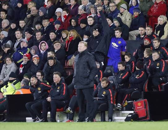 Manchester United ManU s Louis Van Gaal looks on as he substitutes Paddy McNair after 38 minutes Barclays Premier League- Southampton vs Manchester United - St Mary s Stadium - England - 8th December 2014 - Picture David Klein Sportimage EDITORIAL USE ONLY. No use with unauthorised audio, video, data, fixture lists, club league logos or live services. Online in-match use limited to 120 images, no video emulation. No use in betting, games or single club league player publications.