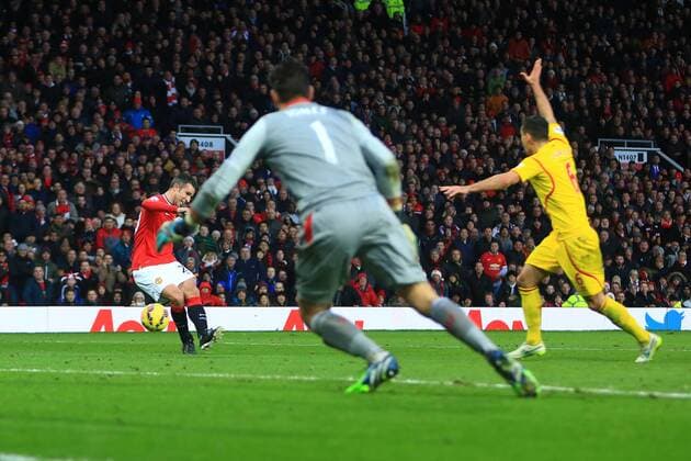 Robin van Persie of Manchester United ManU scores his sides third goal - Manchester United vs. Liverpool - Barclay s Premier League - Old Trafford - Manchester - 14 12 2014 Pic Philip Oldham Sportimage EDITORIAL USE ONLY. No use with unauthorised audio, video, data, fixture lists, club league logos or live services. Online in-match use limited to 120 images, no video emulation. No use in betting, games or single club league player publications.