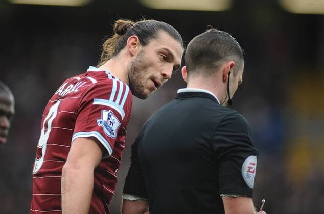 Football - 2014 2015 Premier League - Chelsea vs. West Ham United West ham s Andy Carroll makes his point to referee Michael Oliver after being booked at Stamford Bridge. COLORSPORT ANDREW COWIE