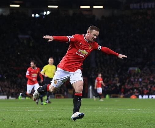 Manchester United ManU s Wayne Rooney celebrates scoring his sides second goal Barclays Premier League - Manchester United vs Newcastle United - Old Trafford - England - 26th December 2014 - Picture David Klein Sportimage EDITORIAL USE ONLY. No use with unauthorised audio, video, data, fixture lists, club league logos or live services. Online in-match use limited to 120 images, no video emulation. No use in betting, games or single club league player publications.
