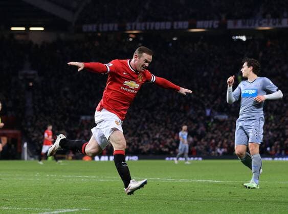 Manchester United ManU s Wayne Rooney celebrates scoring his sides second goal Barclays Premier League - Manchester United vs Newcastle United - Old Trafford - England - 26th December 2014 - Picture David Klein Sportimage EDITORIAL USE ONLY. No use with unauthorised audio, video, data, fixture lists, club league logos or live services. Online in-match use limited to 120 images, no video emulation. No use in betting, games or single club league player publications.