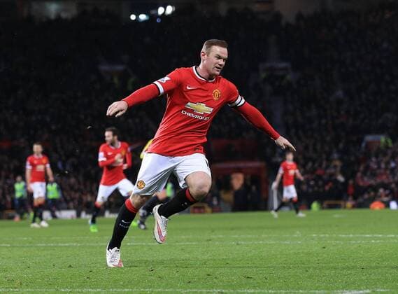 Manchester United ManU s Wayne Rooney celebrates scoring his sides second goal Barclays Premier League - Manchester United vs Newcastle United - Old Trafford - England - 26th December 2014 - Picture David Klein Sportimage EDITORIAL USE ONLY. No use with unauthorised audio, video, data, fixture lists, club league logos or live services. Online in-match use limited to 120 images, no video emulation. No use in betting, games or single club league player publications.