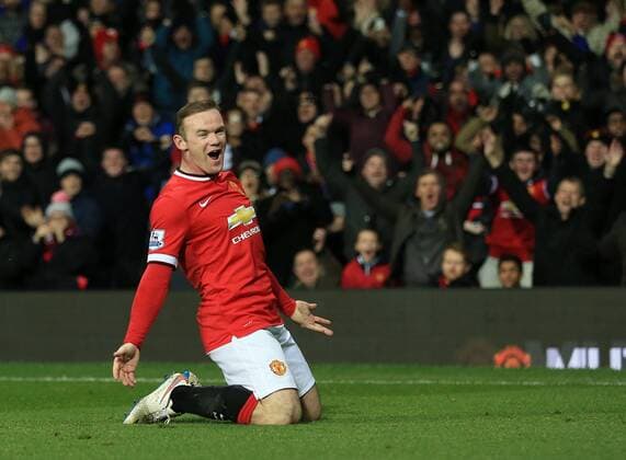Manchester United ManU s Wayne Rooney celebrates scoring his sides second goal Barclays Premier League - Manchester United vs Newcastle United - Old Trafford - England - 26th December 2014 - Picture David Klein Sportimage EDITORIAL USE ONLY. No use with unauthorised audio, video, data, fixture lists, club league logos or live services. Online in-match use limited to 120 images, no video emulation. No use in betting, games or single club league player publications.