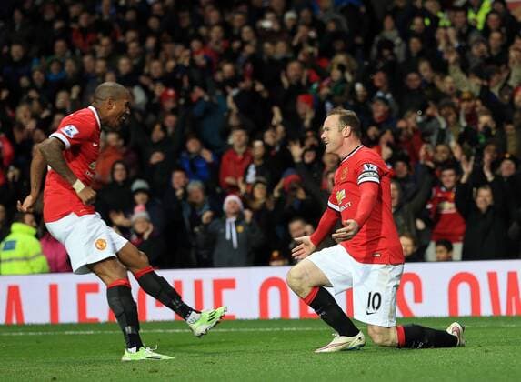 Manchester United ManU s Wayne Rooney celebrates scoring his sides second goal Barclays Premier League - Manchester United vs Newcastle United - Old Trafford - England - 26th December 2014 - Picture David Klein Sportimage EDITORIAL USE ONLY. No use with unauthorised audio, video, data, fixture lists, club league logos or live services. Online in-match use limited to 120 images, no video emulation. No use in betting, games or single club league player publications.