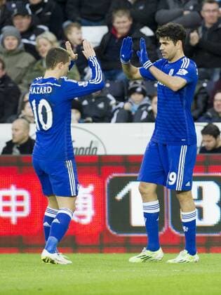 Football - 2014 2015 Premier League - Swansea City vs. Chelsea Diego Costa of Chelsea celebrates scoring their 3rd goal at The Liberty Stadium. COLORSPORT WINSTON BYNORTH
