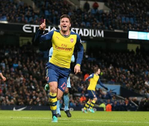 Olivier Giroud of Arsenal celebrates scoring the second goal - Barclays Premier League - Manchester City vs Arsenal - Etihad Stadium - Manchester - England - 18th January 2015 - Picture Simon Bellis Sportimage EDITORIAL USE ONLY. No use with unauthorised audio, video, data, fixture lists, club league logos or live services. Online in-match use limited to 120 images, no video emulation. No use in betting, games or single club league player publications.