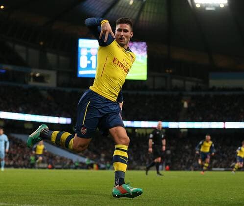 Olivier Giroud of Arsenal celebrates scoring the second goal - Barclays Premier League - Manchester City vs Arsenal - Etihad Stadium - Manchester - England - 18th January 2015 - Picture Simon Bellis Sportimage EDITORIAL USE ONLY. No use with unauthorised audio, video, data, fixture lists, club league logos or live services. Online in-match use limited to 120 images, no video emulation. No use in betting, games or single club league player publications.