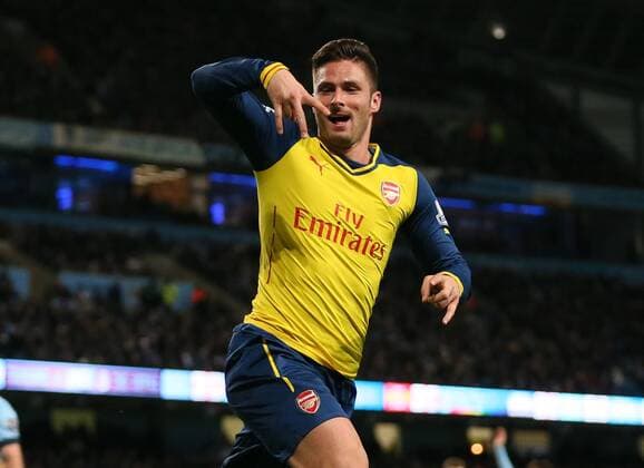 Olivier Giroud of Arsenal celebrates scoring the second goal - Barclays Premier League - Manchester City vs Arsenal - Etihad Stadium - Manchester - England - 18th January 2015 - Picture Simon Bellis Sportimage EDITORIAL USE ONLY. No use with unauthorised audio, video, data, fixture lists, club league logos or live services. Online in-match use limited to 120 images, no video emulation. No use in betting, games or single club league player publications.