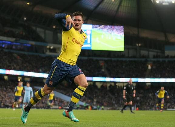 Olivier Giroud of Arsenal celebrates scoring his goal to make the score 0-2 - Barclays Premier League - Manchester City vs Arsenal - Etihad Stadium - Manchester - England - 18th January 2015 - Picture Simon Bellis Sportimage EDITORIAL USE ONLY. No use with unauthorised audio, video, data, fixture lists, club league logos or live services. Online in-match use limited to 120 images, no video emulation. No use in betting, games or single club league player publications.