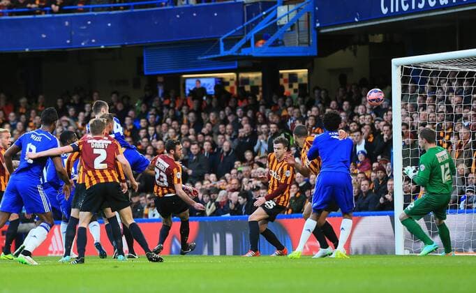 Chelsea s Gary Cahill scoring his sides opening goal FA Cup Fourth Round - Chelsea vs Bradford City - Stamford Bridge - England - 24th January 2015 - Picture David Klein Sportimage EDITORIAL USE ONLY. No use with unauthorised audio, video, data, fixture lists, club league logos or live services. Online in-match use limited to 120 images, no video emulation. No use in betting, games or single club league player publications.