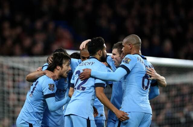 (150201) -- LONDON, Jan. 31, 2015 -- David Silva (1st L) of Manchester City celebrates with his teammates after scoring during the Barclays Premier League match between Chelsea and Manchester City at Stamford Bridge in London, England on January 31, 2015. The match ended in 1-1 draw. ) FOR EDITORIAL USE ONLY. NOT FOR SALE FOR MARKETING OR ADVERTISING CAMPAIGNS. NO USE WITH UNAUTHORIZED AUDIO, VIDEO, DATA, FIXTURE LISTS, CLUB LEAGUE LOGOS OR LIVE SERVICES. ONLINE IN-MATCH USE LIMITED TO 45 IMAGES, NO VIDEO EMULATION. NO USE IN BETTING, GAMES OR SINGLE CLUB LEAGUE PLAYER PUBLICATIONS. (SP)UK-LONDON-SOCCER-BARCLAYS PREMIER LEAGUE-CHELSEA VS MANCHESTER CITY HanxYan