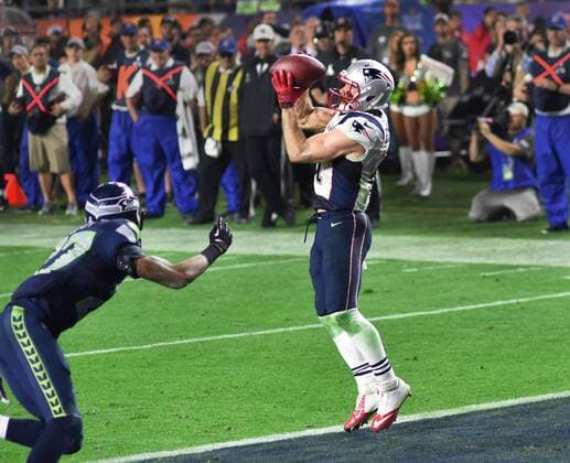 Feb. 1, 2015 - Glendale, Arizona, U.S - New England Patriots wide receiver, JULIAN EDELMAN, receives winning touchdown with 2:02 remaining in Super Bowl XLIX giving the Patriots a 28-24 victory. EDELMAN had 9 receptions and one touchdown. NFL American Football Herren USA SUPER BOWL 2015 - Patriots beat Seahawks 28-24 - ZUMAd50_