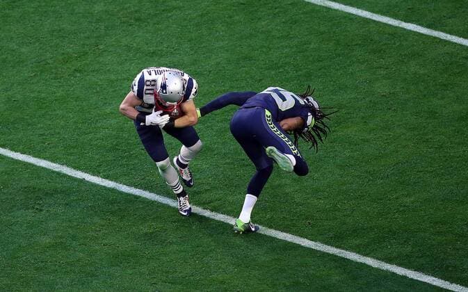 01 February 2015: New England Patriots wide receiver Danny Amendola 80 is hit by Seattle Seahawks cornerback Richard Sherman 25 during the first half of Super Bowl XLIX between the Seattle Seahawks and the New England Patriots at University of Phoenix Stadium in Glendale, Az. NFL American Football Herren USA FEB 01 Super Bowl XLIX - Patriots v Seahawks Icon3171502010831 EDITORIAL USE ONLY