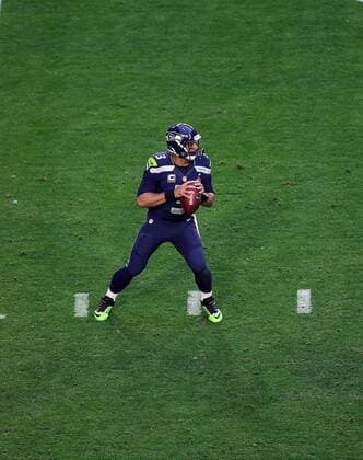 01 February 2015: Seattle Seahawks quarterback Russell Wilson 3 throws during the first half of Super Bowl XLIX between the Seattle Seahawks and the New England Patriots at University of Phoenix Stadium in Glendale, Az. NFL American Football Herren USA FEB 01 Super Bowl XLIX - Patriots v Seahawks Icon3171502011213 EDITORIAL USE ONLY