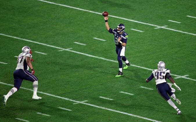 01 February 2015: Seattle Seahawks quarterback Russell Wilson 3 throws a pass during the second half of Super Bowl XLIX between the Seattle Seahawks and the New England Patriots at University of Phoenix Stadium in Glendale, Az. The New England Patriots beat the Seattle Seahawks 28-24. NFL American Football Herren USA FEB 01 Super Bowl XLIX - Patriots v Seahawks Icon3171502012457 EDITORIAL USE ONLY