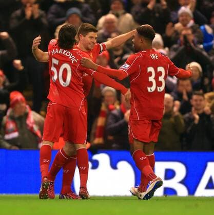 Steven Gerrard of Liverpool celebrates scoring his sides second goal - Liverpool vs. Tottenham Hotspurs - Barclay s Premier League - Anfield - Liverpool - 10 02 2015 Pic Philip Oldham Sportimage EDITORIAL USE ONLY. No use with unauthorised audio, video, data, fixture lists, club league logos or live services. Online in-match use limited to 120 images, no video emulation. No use in betting, games or single club league player publications.