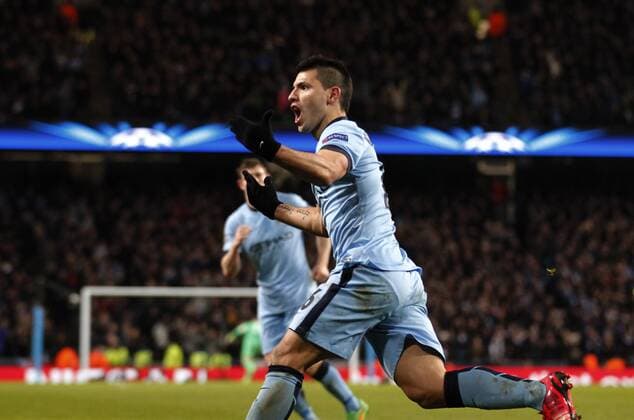Sergio Kun Aguero of Manchester City celebrates after scoring during the UEFA Champions league Round of 16 first leg match between Manchester City and Barcelona at Etihad Stadium in Manchester, Britain, on Feb. 24, 2015. Barcelona won 2-1. ) (SP)BRITAIN-MANCHESTER-FOOTBALL-CHAMPIONS LEAGUE-ROUND OF 16 1ST LEG-MANCHESTER CITY VS BARCELONA HanxYan