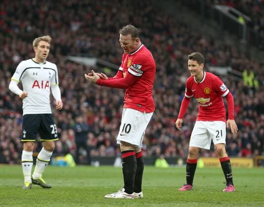 Wayne Rooney of Manchester United ManU reacts after missing a chance to score - Barclays Premier League - Manchester Utd vs Tottenham Hotspur - Old Trafford Stadium - Manchester - England - 15th March 2015 - Picture SimonBellis Sportimage EDITORIAL USE ONLY. No use with unauthorised audio, video, data, fixture lists, club league logos or live services. Online in-match use limited to 120 images, no video emulation. No use in betting, games or single club league player publications.