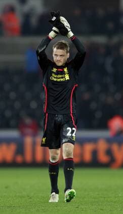 Simon Mignolet of Liverpool celebrates the win - Barclays Premier League - Swansea City vs Liverpool - Liberty Stadium - Swansea - Wales - 16th March 2015 - Picture Simon Bellis Sportimage EDITORIAL USE ONLY. No use with unauthorised audio, video, data, fixture lists, club league logos or live services. Online in-match use limited to 120 images, no video emulation. No use in betting, games or single club league player publications.