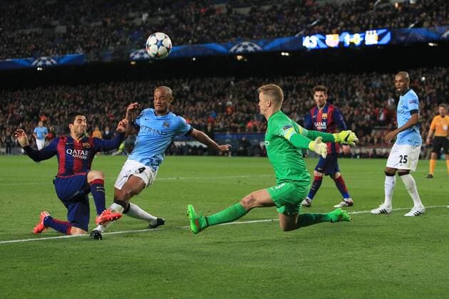 Joe Hart of Manchester City saves a shot from Luis Suarez of Barcelona - Barcelona vs. Manchester City - UEFA Champion s League - Round of 16, second leg - Nou Camp - Barcelona - 18 03 2015 Pic Philip Oldham Sportimage EDITORIAL USE ONLY. No use with unauthorised audio, video, data, fixture lists, club league logos or live services. Online in-match use limited to 120 images, no video emulation. No use in betting, games or single club league player publications.