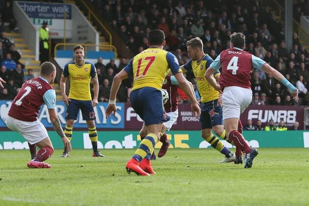 Arsenal s Aaron Ramsey scores the opening goal - Burnley vs. Arsenal - Barclay s Premier League - Turf Moor - Burnley - 11 04 2015 Pic Philip Oldham Sportimage EDITORIAL USE ONLY. No use with unauthorised audio, video, data, fixture lists, club league logos or live services. Online in-match use limited to 120 images, no video emulation. No use in betting, games or single club league player publications.