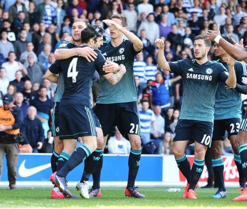 Chelsea s Cesc Fabregas celebrates scoring his sides opening goal Barclays Premier League- Queens Park Rangers vs Chelsea - Loftus Road - England - 12h April 2015 - Picture David Klein Sportimage EDITORIAL USE ONLY. No use with unauthorised audio, video, data, fixture lists, club league logos or live services. Online in-match use limited to 120 images, no video emulation. No use in betting, games or single club league player publications.