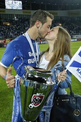 - GENT, BELGIUM: Gent s Brecht Dejaegere holds the trophy after winning the Jupiler Pro League match between KAA Gent and Standard de Liege, Thursday 21 May 2015 in Gent, on the ninth day of the Play-off 1. THIERRYxROGE x04628025x