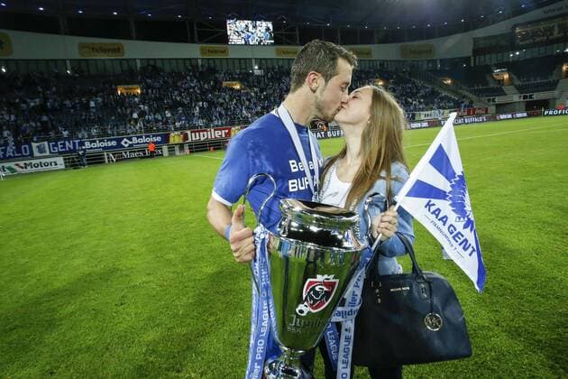 - GENT, BELGIUM: Gent s Brecht Dejaegere holds the trophy after winning the Jupiler Pro League match between KAA Gent and Standard de Liege, Thursday 21 May 2015 in Gent, on the ninth day of the Play-off 1. THIERRYxROGE x04628026x
