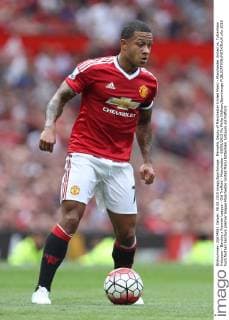 Memphis Depay of Manchester United ManU - Manchester United vs. Tottenham Hotspurs - Barclay s Premier League - Old Trafford - Manchester - 08 08 2015 Pic Philip Oldham Sportimage EDITORIAL USE ONLY. No use with unauthorised audio, video, data, fixture lists, club league logos or live services. Online in-match use limited to 120 images, no video emulation. No use in betting, games or single club league player publications.