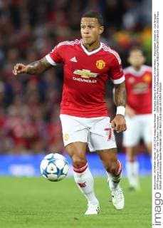 Memphis Depay of Manchester United ManU - Manchester United vs. Club Brugge - UEFA Champion s League Play Off - Old Trafford - Manchester - 18 08 2015 Pic Philip Oldham SportImage EDITORIAL USE ONLY. No use with unauthorised audio, video, data, fixture lists, club league logos or live services. Online in-match use limited to 120 images, no video emulation. No use in betting, games or single club league player publications.