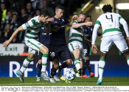 Aug. 19, 2015 - Glasgow, Skottland - 150819 Malmö FFs Nikola Djurjic pa genombrott i kamp med Celtics Nir Biton och Scott Brown under fotbollsmatchen mellan Celtic och Malmö FF i kvalet till Champions League den 19 augusti 2015 i Glasgow..Foto: News - Aug. 19, 2015 - ZUMAb138