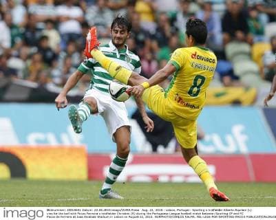 Aug. 22, 2015 - Lisbon, Portugal - Sporting s midfielder Alberto Aquilani (L) vies for the ball with Pacos Ferreira s midfielder Christian (R) during the Portuguese League football match between Sporting CP and FC Pacos de Ferreira at Jose Alvalade Stadium in Lisbon on August 22, 2015. NURPHOTO CARLOS PALMA. FBL-LIGA-POR-SPORTING-PACOS - ZUMAn230
