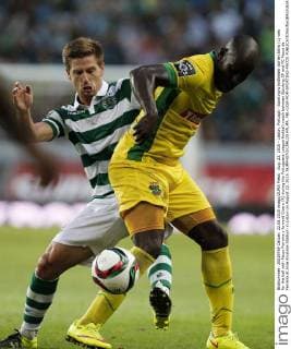 Aug. 22, 2015 - Lisbon, Portugal - Sporting s midfielder Adrien Silva (L) vies for the ball with Pacos Ferreira s forward Cicero (R) during the Portuguese League football match between Sporting CP and FC Pacos de Ferreira at Jose Alvalade Stadium in Lisbon on August 22, 2015. NURPHOTO CARLOS PALMA. FBL-LIGA-POR-SPORTING-PACOS - ZUMAn230