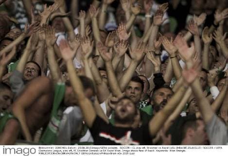 SOCCER - CL play off, Shakhtar vs Rapid LVIV,UKRAINE,25.AUG.15 - SOCCER - UEFA Champions League, play off, FC Shakhtar Donetsk vs SK Rapid Wien. Image shows fans of Rapid. Keywords: Wien Energie. GEPAxpictures xPhilippxBrem