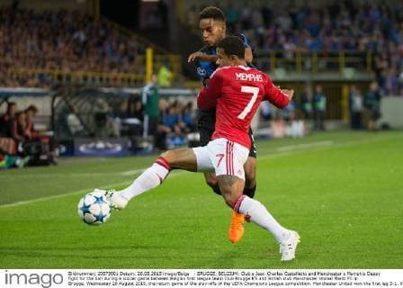 - BRUGGE, BELGIUM: Club s Jean-Charles Castelletto and Manchester s Memphis Depay fight for the ball during a soccer game between Belgian first league team Club Brugge KV and British club Manchester United ManU FC in Brugge, Wednesday 26 August 2015, the return game of the play-offs of the UEFA Champions League competition. Manchester United won the first leg 3-1. KURTxDESPLENTER x04687486x