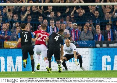 - BRUGGE, BELGIUM: Manchester s Luke Shaw and Club s goalkeeper Sinan Bolat fight for the ball during a soccer game between Belgian first league team Club Brugge KV and British club Manchester United ManU FC in Brugge, Wednesday 26 August 2015, the return game of the play-offs of the UEFA Champions League competition. Manchester United won the first leg 3-1. KURTxDESPLENTER x04687495x