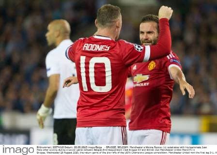 - BRUGGE, BELGIUM: Manchester s Wayne Rooney (c) celebrates with his teammate Juan Mata after scoring during a soccer game between Belgian first league team Club Brugge KV and British club Manchester United ManU FC in Brugge, Wednesday 26 August 2015, the return game of the play-offs of the UEFA Champions League competition. Manchester United won the first leg 3-1. KURTxDESPLENTER x04687649x