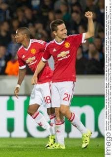 - BRUGGE, BELGIUM: Manchester s Ander Herrera (R) celebrates with his teammate Ashley Young after scoring during a soccer game between Belgian first league team Club Brugge KV and British club Manchester United ManU FC in Brugge, Wednesday 26 August 2015, the return game of the play-offs of the UEFA Champions League competition. Manchester United won the first leg 3-1. KURTxDESPLENTER x04687657x