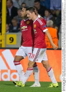 - BRUGGE, BELGIUM: Manchester s Ander Herrera (R) celebrates with his teammate Memphis Depay after scoring during a soccer game between Belgian first league team Club Brugge KV and British club Manchester United ManU FC in Brugge, Wednesday 26 August 2015, the return game of the play-offs of the UEFA Champions League competition. Manchester United won the first leg 3-1. KURTxDESPLENTER x04687662x