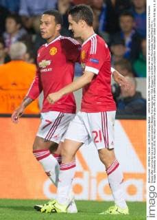 - BRUGGE, BELGIUM: Manchester s Ander Herrera (R) celebrates with his teammate Memphis Depay after scoring during a soccer game between Belgian first league team Club Brugge KV and British club Manchester United ManU FC in Brugge, Wednesday 26 August 2015, the return game of the play-offs of the UEFA Champions League competition. Manchester United won the first leg 3-1. KURTxDESPLENTER x04687663x