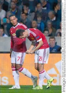 - BRUGGE, BELGIUM: Manchester s Ander Herrera (R) celebrates with his teammate Memphis Depay after scoring during a soccer game between Belgian first league team Club Brugge KV and British club Manchester United ManU FC in Brugge, Wednesday 26 August 2015, the return game of the play-offs of the UEFA Champions League competition. Manchester United won the first leg 3-1. KURTxDESPLENTER x04687665x