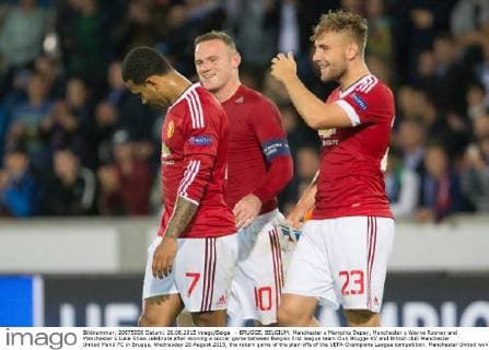 - BRUGGE, BELGIUM: Manchester s Memphis Depay, Manchester s Wayne Rooney and Manchester s Luke Shaw celebrate after winning a soccer game between Belgian first league team Club Brugge KV and British club Manchester United ManU FC in Brugge, Wednesday 26 August 2015, the return game of the play-offs of the UEFA Champions League competition. Manchester United won the first leg 3-1. KURTxDESPLENTER x04687728x